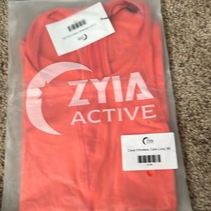 ZYIA ACTIVE Coral Effortless Tank-Long (M) as pictured active wear.